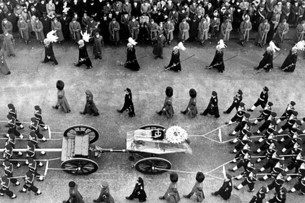 The coffin of King George VI passes through Picadilly on its way to Paddington Station en route to Windsor, in 1952.