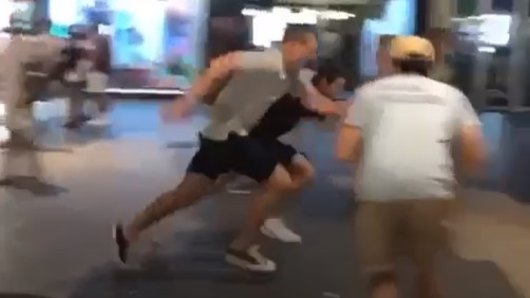 Tom Trbojevic in a foot race on Manly Corso.