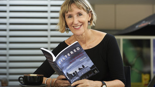 Dr Emma Felton with her recently published book Filtered: Coffee, the cafe and the 21st century City.