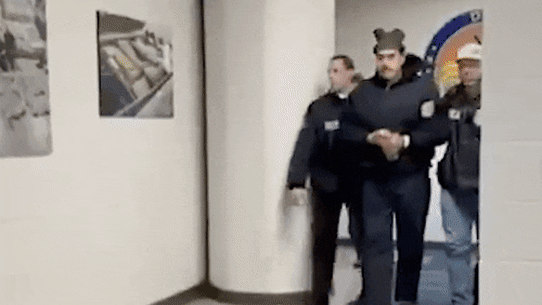 Venezuelan leader Nicolas Maduro being “perp walked” by Drug Enforcement Administration officers in New York.