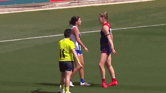 Melbourne's Eden Zanker taunts former Demons teammate Libby Birch, now at North Melbourne, during the 2025 AFLW qualifying final.