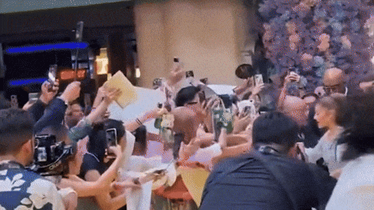 Cynthia Erivo leaps into action as public nuisance Johnson Wen grabs Ariana Grande.