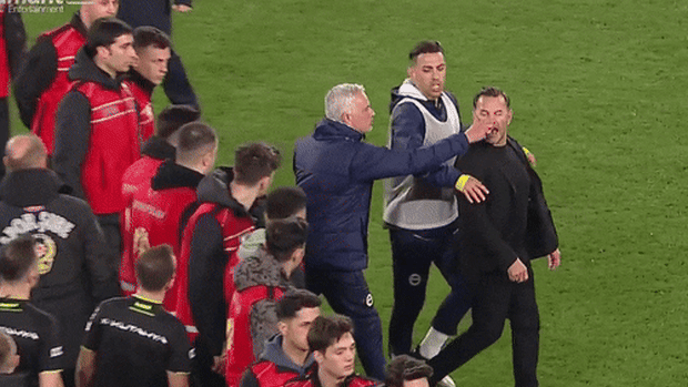 Fenerbahce manager Jose Mourinho squeezed Okun Buruk’s nose which left the Galatasaray manager writhing on the turf.