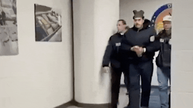 Venezuelan leader Nicolas Maduro being “perp walked” by Drug Enforcement Administration officers in New York.