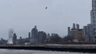 Video footage shows a helicopter plummeting into the Hudson River.