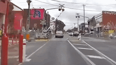 Video of train hitting car at Brunswick shows boom gate lifting ahead of crash