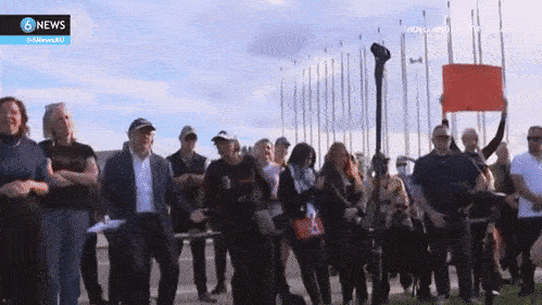 Albanese speaking at a domestic violence rally.