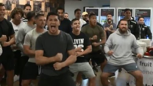 Two worlds collide: The Kiwis perform a haka for the Liverpool team. 