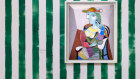 Picasso’s ‘Portrait de Marie-Therese’ (1937) set off by Paul Smith with green and white stripes.