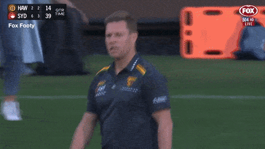Sam Mitchell gives Jack Scrimshaw a ferocious spray at quarter-time in round seven.