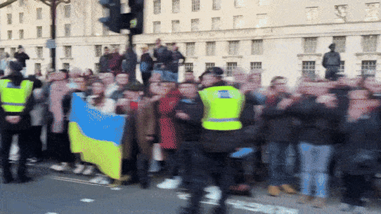 British crowds line the street as Ukraine President Volodymyr Zelensky arrives at Downing Street.
