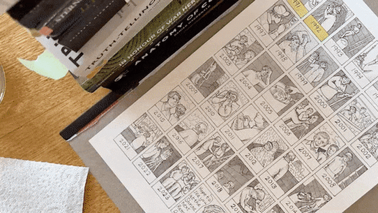 Laura J. Carroll drawing a page from Making The Shrine.