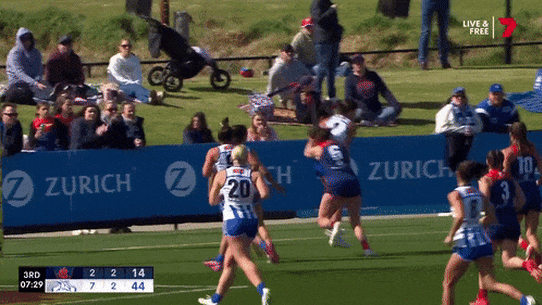 Libby Birch is heavily tackled by her former teammate.