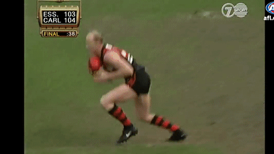 Fraser Brown tackles Dean Wallis in the dying stages of the 1999 preliminary final.