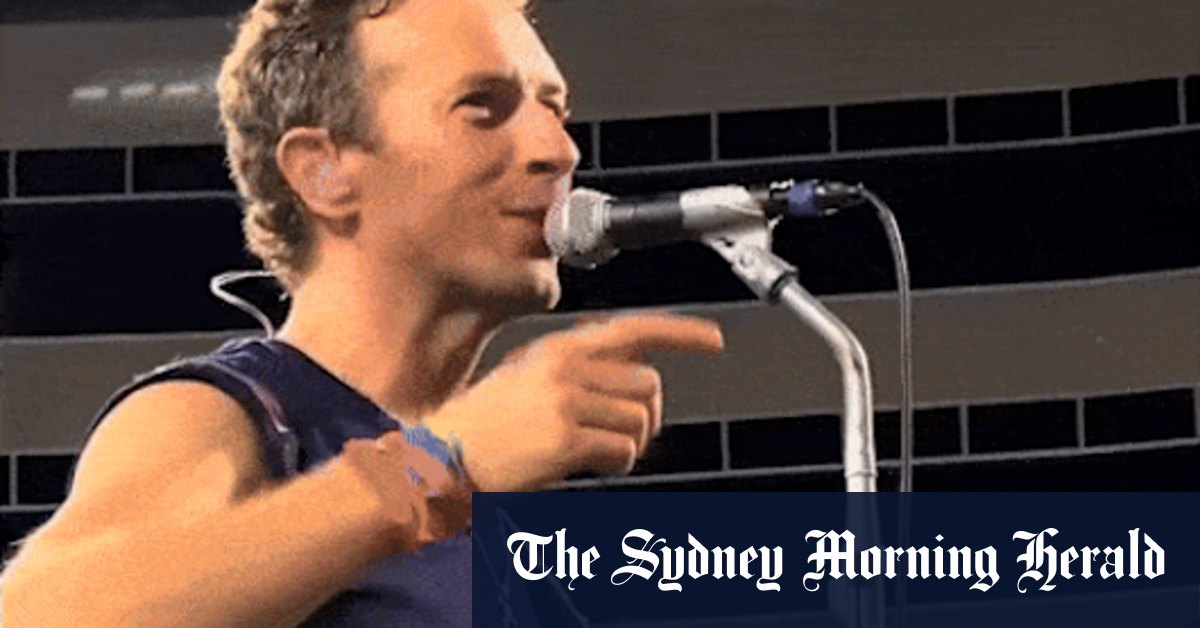 Chris Martin performing on stage