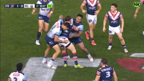 Felise Kaufusi and Angus Crichton clash during the Storm-Roosters match last weekend.