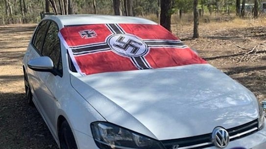 A photo posted on social media in 2020 of a vehicle displaying a Nazi flag outside Gladstone.