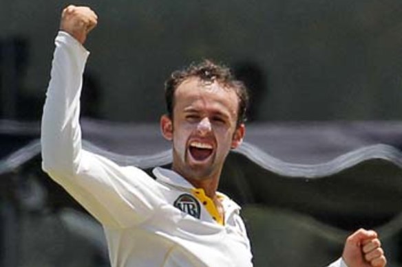 Nathan Lyon celebrates the dismissal of Sri Lanka’s Kumar Sangakkara with his first ball in Test cricket.