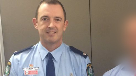 Former police commander Joel Murchie has been charged with indecent assault.