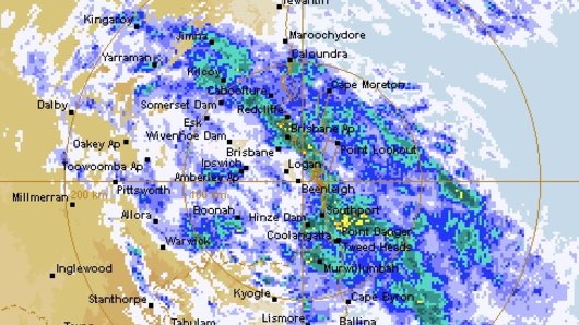 The Brisbane weather radar showing a clump of rain clouds sweeping across the south-eastern corner of Queensland on Monday.