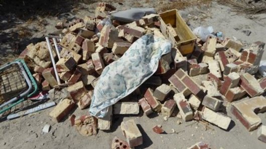 Giuseppe Napoli dumped bricks and sand waste.