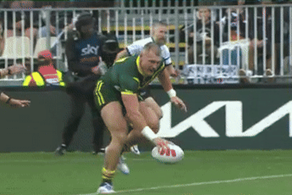 Angus Crichton bombs a try for Australia with a lazy put-down over the tryline.