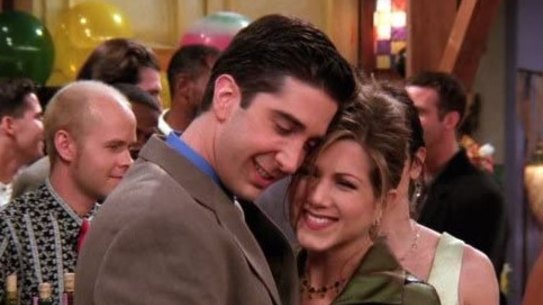 David Schwimmer and Jennifer Aniston (AKA: Ross and Rachel) embrace on the set of Friends.
