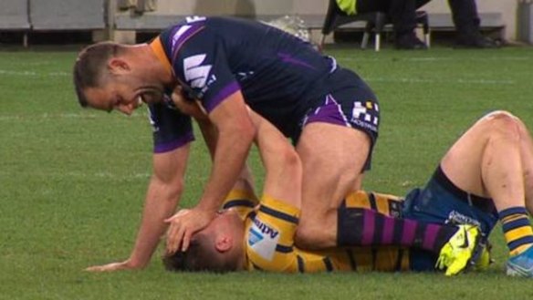 Riled: Cameron Smith and Reed Mahoney in the incident that led to Smith's sin bin. 