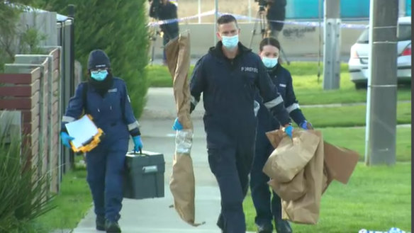 Forensics officers at the scene of Cranbourne homicide.