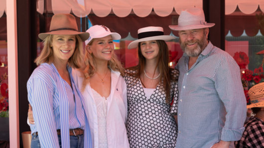 Family affair: actor Rachel Griffiths with daughters Adelaide and Clem, and her artist husband Andy Taylor, at the Australian Open.