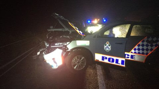 Two boys have been charged after a joyride ended when the car they were in smashed into a police car.