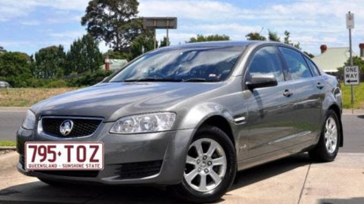 Three men fled a home invasion in a Grey 2010 Holden Commodore with Queensland registration 795-TOZ (similar to pictured).