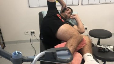 Nathan Cleary on the phone to Brad Fittler, hours after learning his ankle injury was not as bad as first thought.