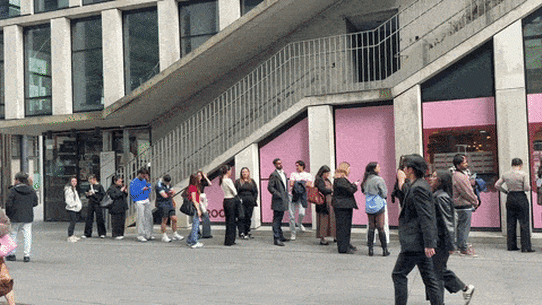 People queueing for food in Sydney.