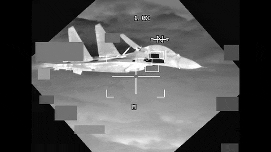 A Chinese J-11 fighter jet nears a US B-52 bomber.