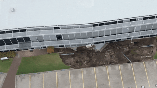 A building teeters on the edge of the sinkhole in Rockdale in Sydney’s south.