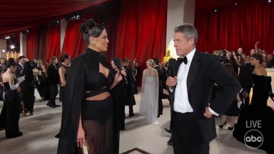 Ashley Graham, Hugh Grant GIF
