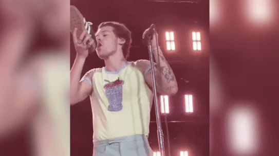 Harry Styles does his first ever shoey at HBF Park in Perth.