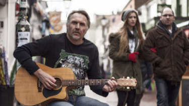 Olympic gold medallist Neil Brooks  photographed busking in London. 