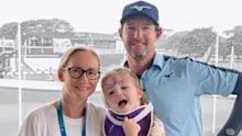 Brett Rankin with his wife and daughter.