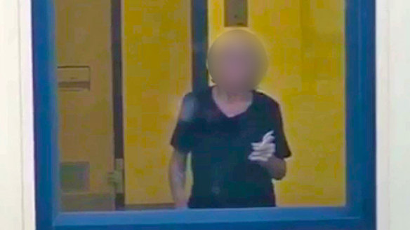 Another image of the woman in her room at the high-security detention centre.