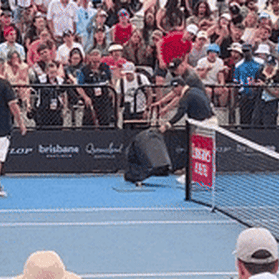 A snake catcher on court during Dominic Thiem’s match with James McCabe.