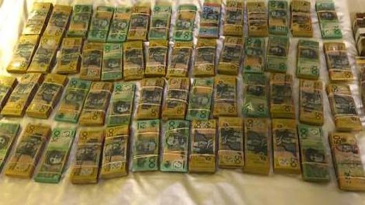 Police seized $650,000 in cash and a kilogram of cocaine following the arrest of three men in Mandurah.