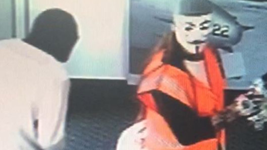 Masked thieves rob a Bendigo Bank in Laverton in December 2017.