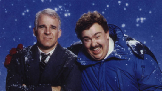 John Candy with Steve Martin in Planes, Trains and Automobiles.