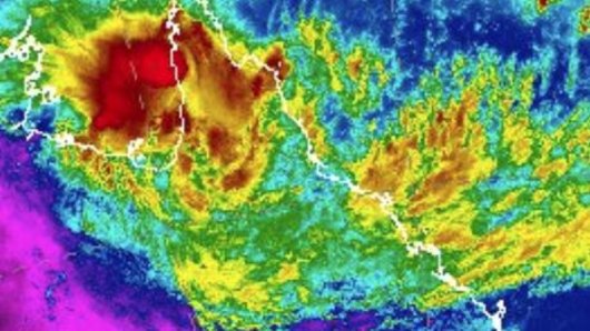 The tropical low over north Queensland responsible for massive rainfall totals overnight.