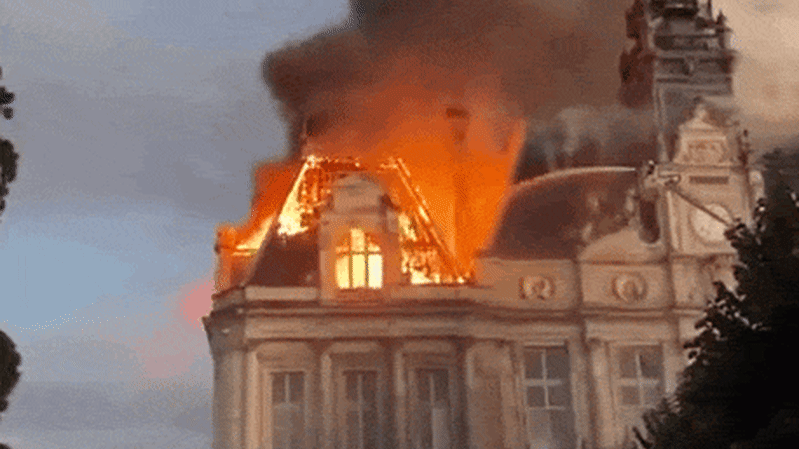 Macron to address nation as riots spark looting and US president claims France is burning