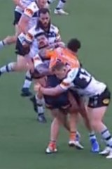 Andrew Fifita makes a tackle on Newcastleâs David Klemmer.