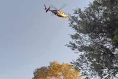 A police helicopter searches for a man in Rouse Hill on Wednesday.