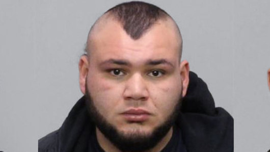 Ali El Nasher is still wanted over the shootings at Melbourne Pavilion.